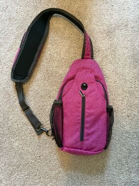 Sling backpack. Security pocket! Water bottle holders. EUC
